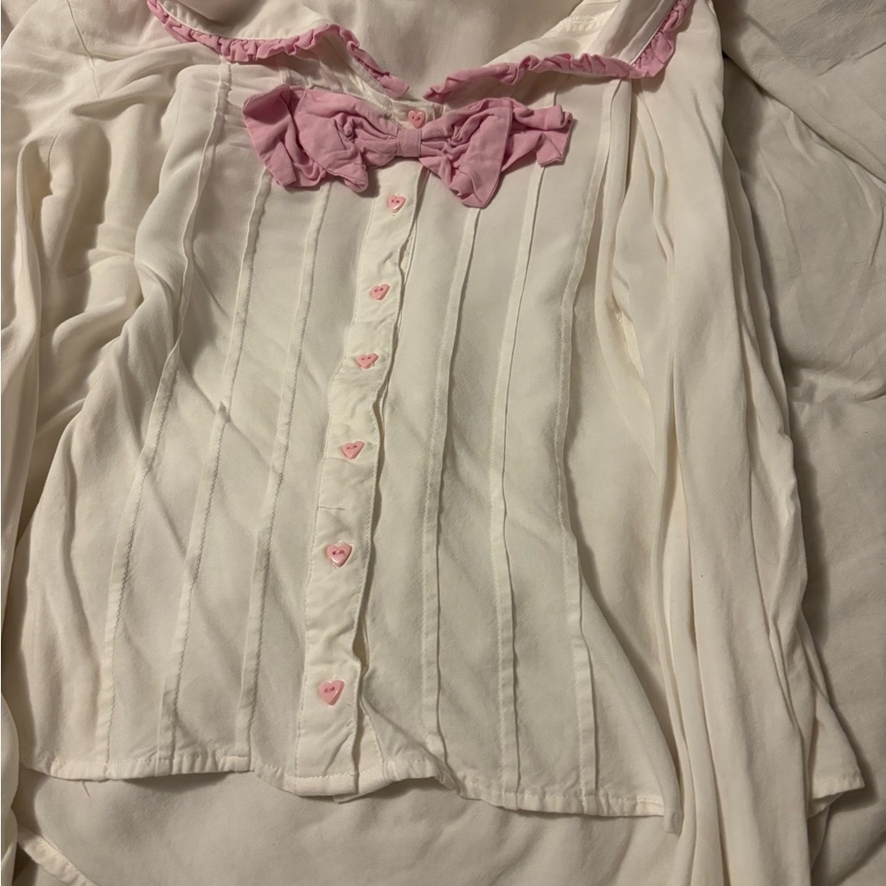 Elegant Cream Blouse with Pink Accents